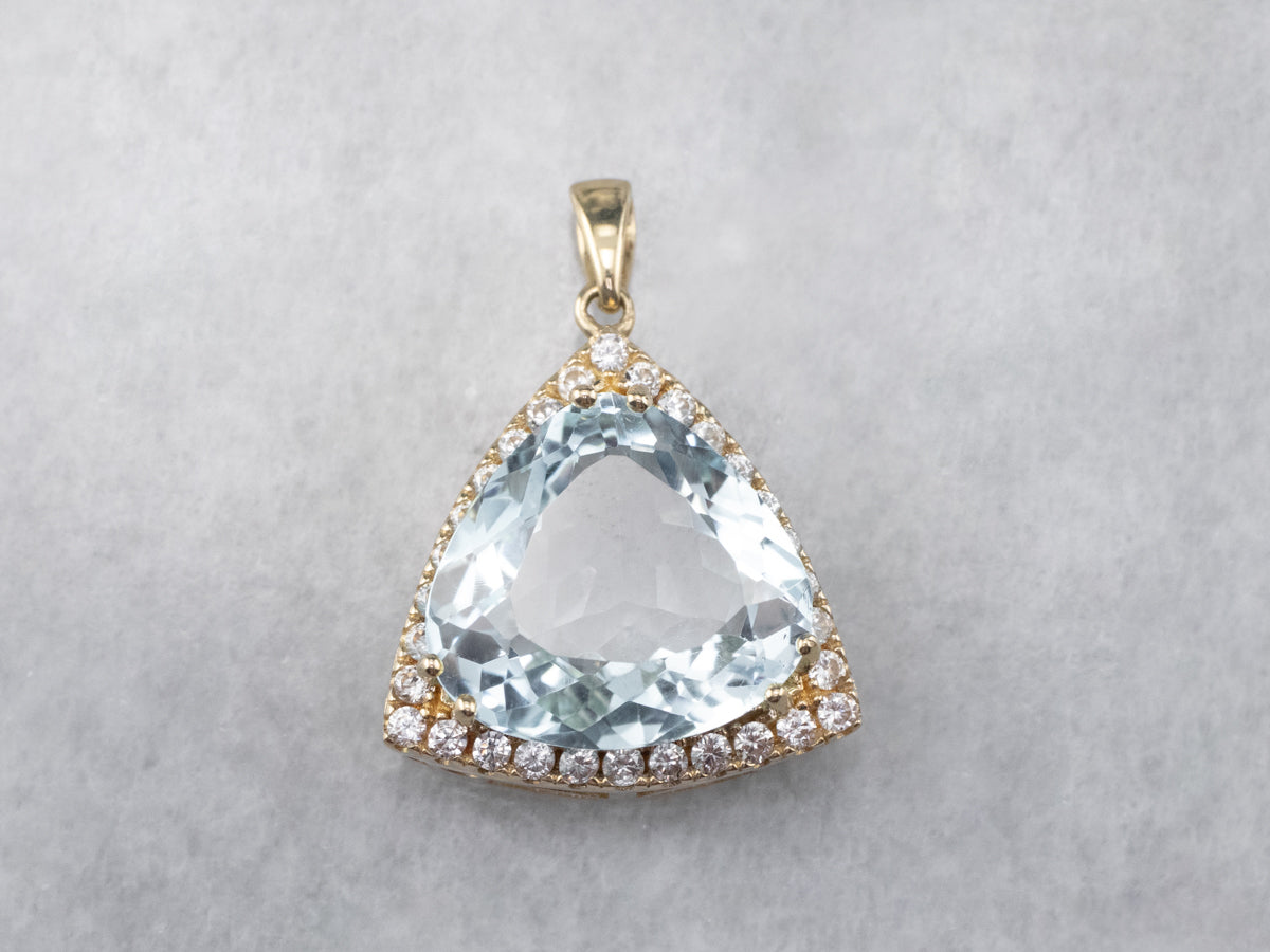 Blue Topaz White Sapphire Gold Halo Pendant
