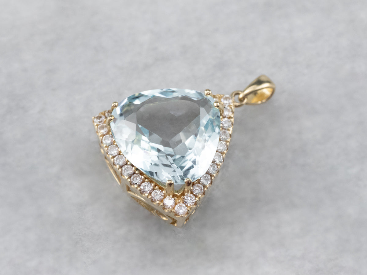 Blue Topaz White Sapphire Gold Halo Pendant