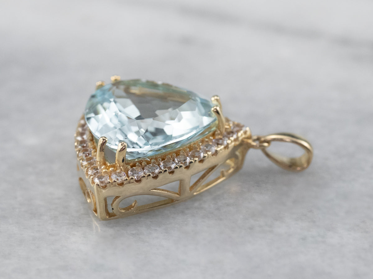 Blue Topaz White Sapphire Gold Halo Pendant