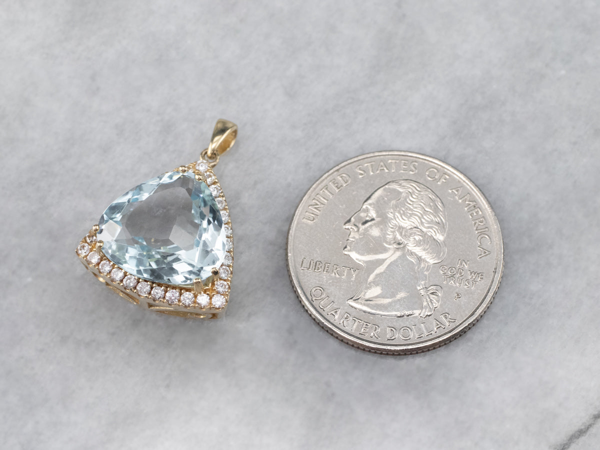 Blue Topaz White Sapphire Gold Halo Pendant