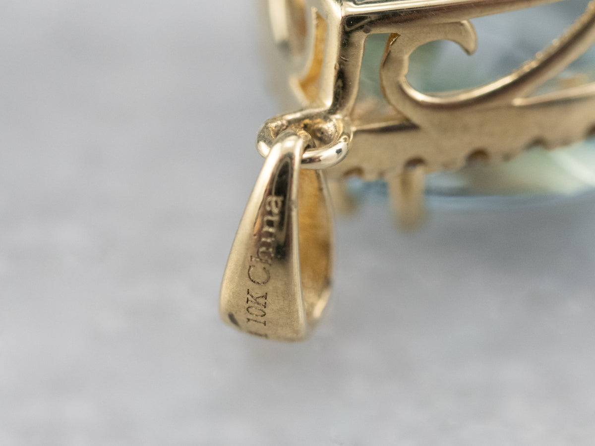 Blue Topaz White Sapphire Gold Halo Pendant