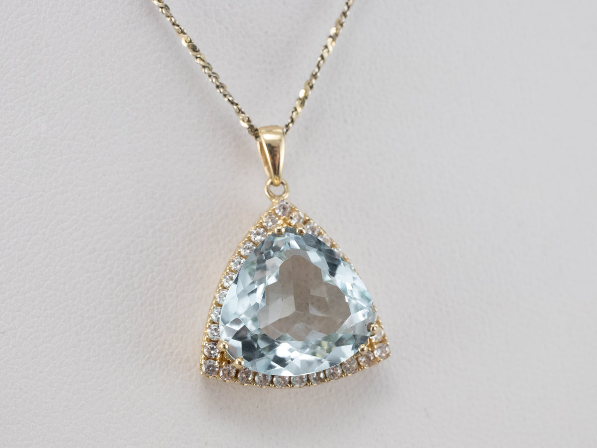 Blue Topaz White Sapphire Gold Halo Pendant
