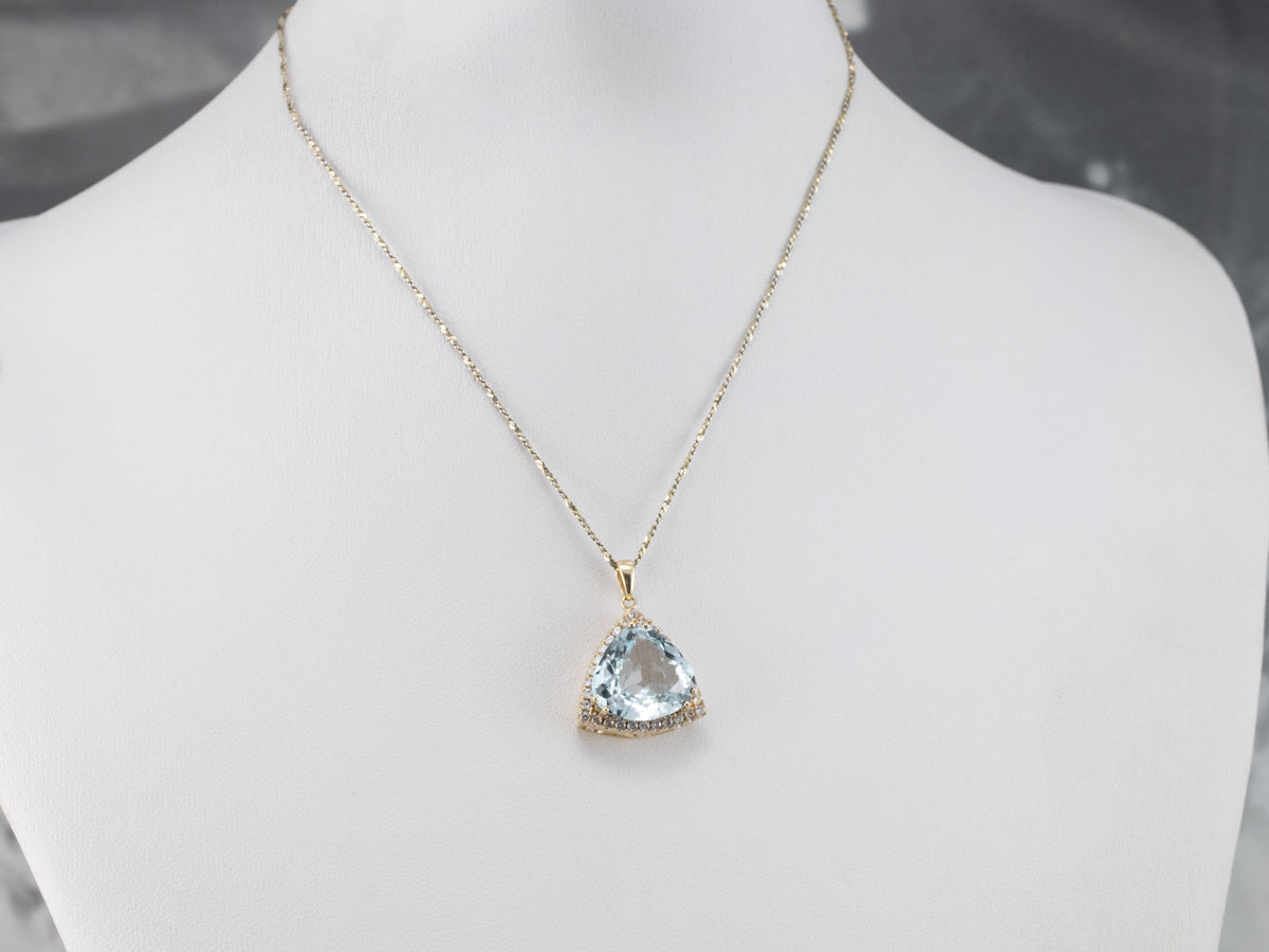 Blue Topaz White Sapphire Gold Halo Pendant