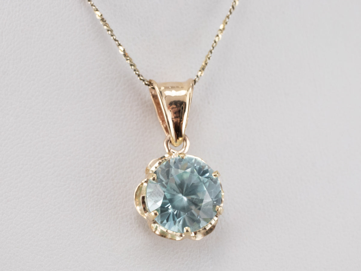 Blue Zircon Buttercup Pendant