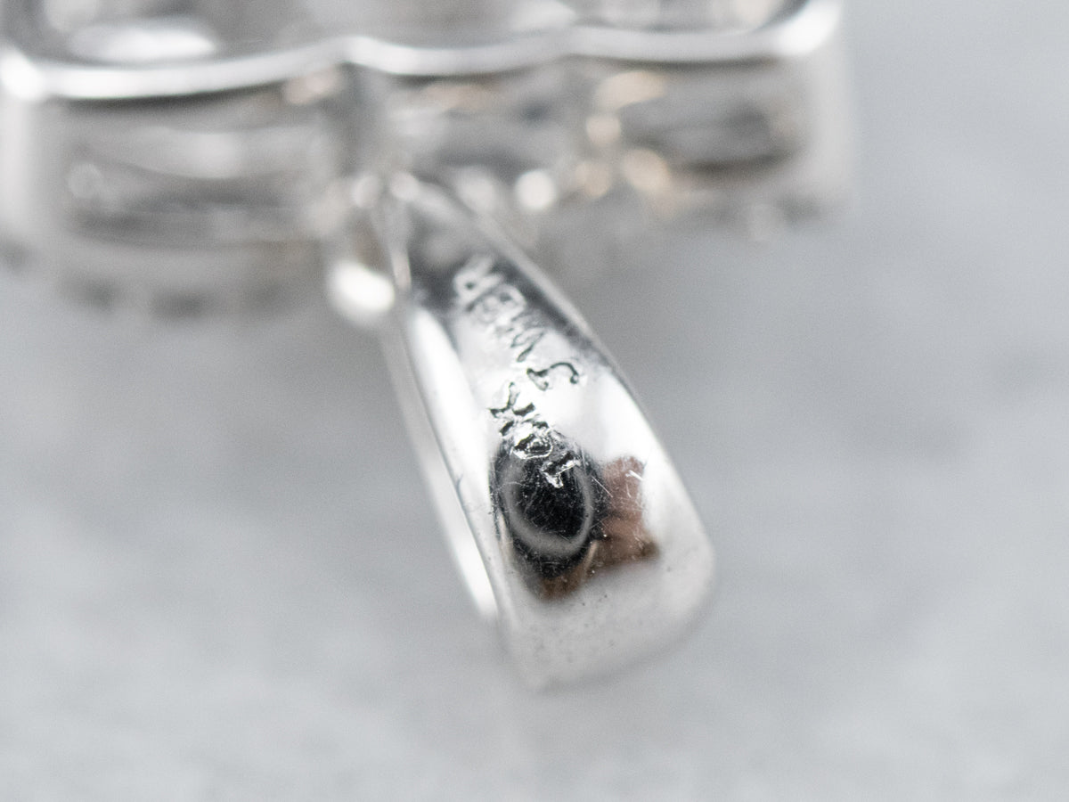 Twisting Diamond Halo Pendant