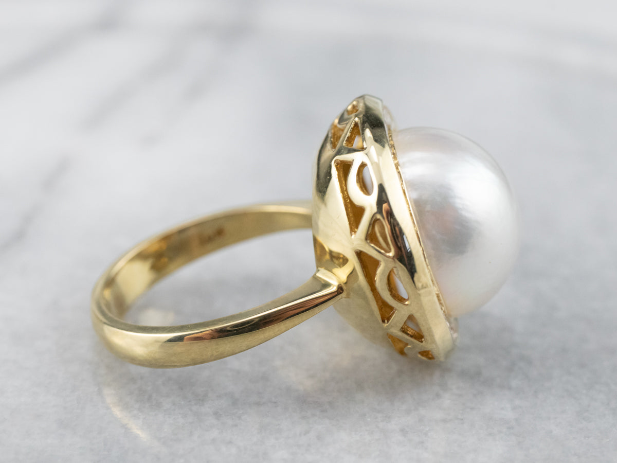 Mabe Pearl and Diamond Halo Cocktail Ring
