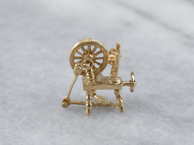 Moving Gold Spinning Wheel Charm