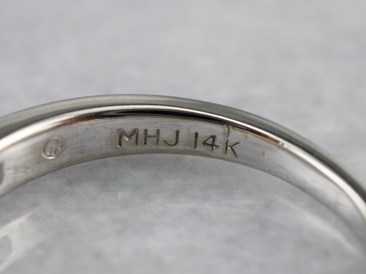 Anillo de compromiso de oro blanco con diamantes