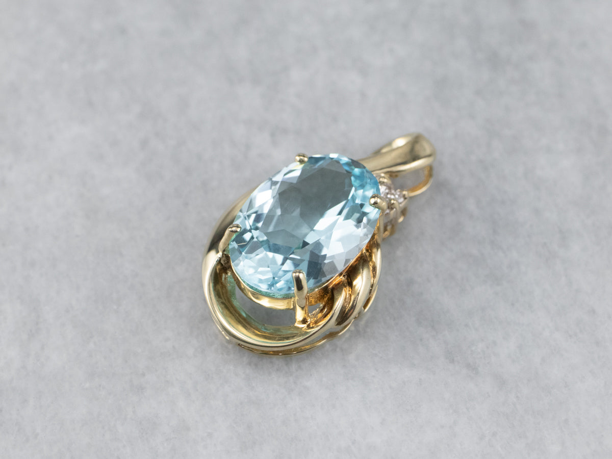 Modern Blue Topaz and Diamond Pendant