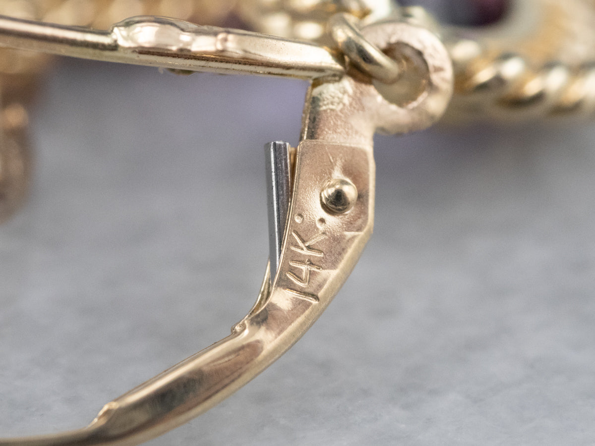 Twisting Gold Amethyst Drop Earrings