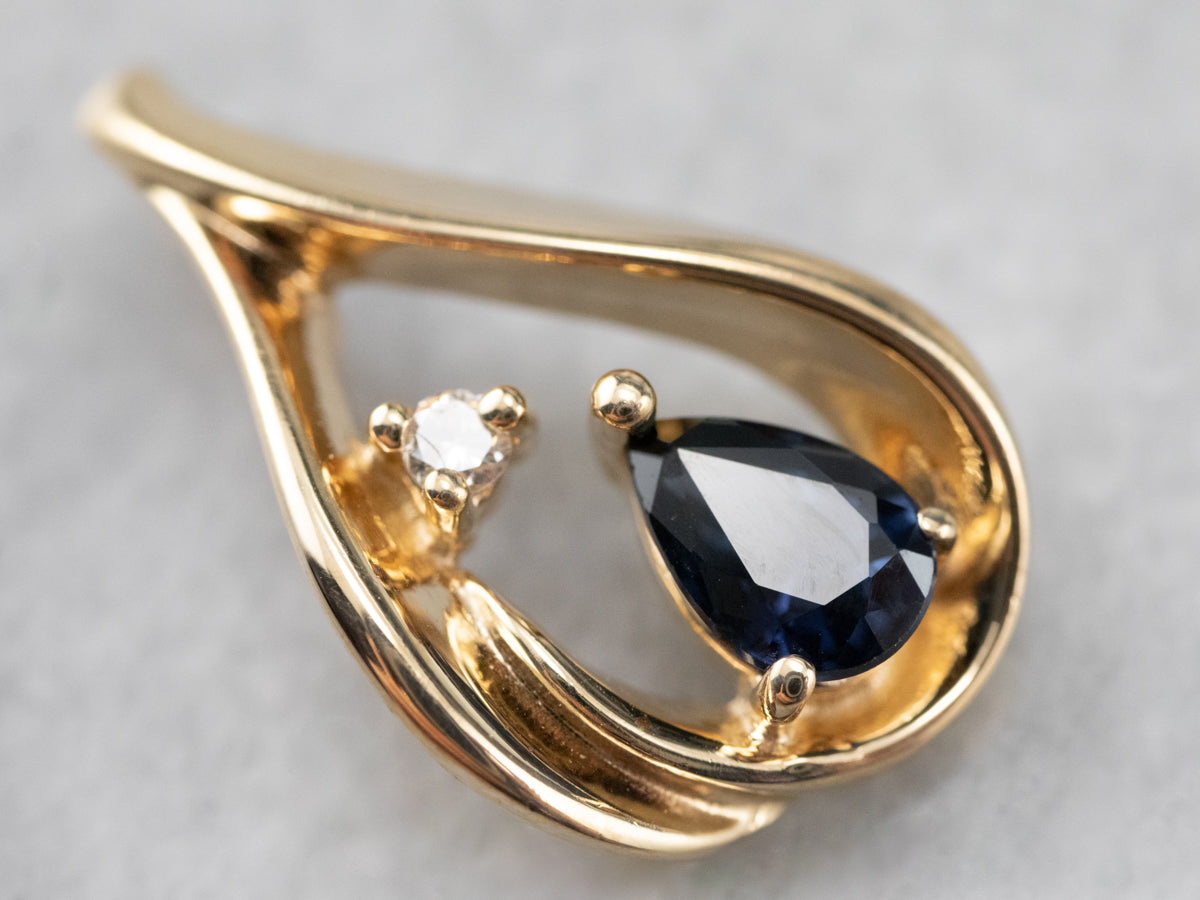 Colgante de oro, zafiro y diamantes