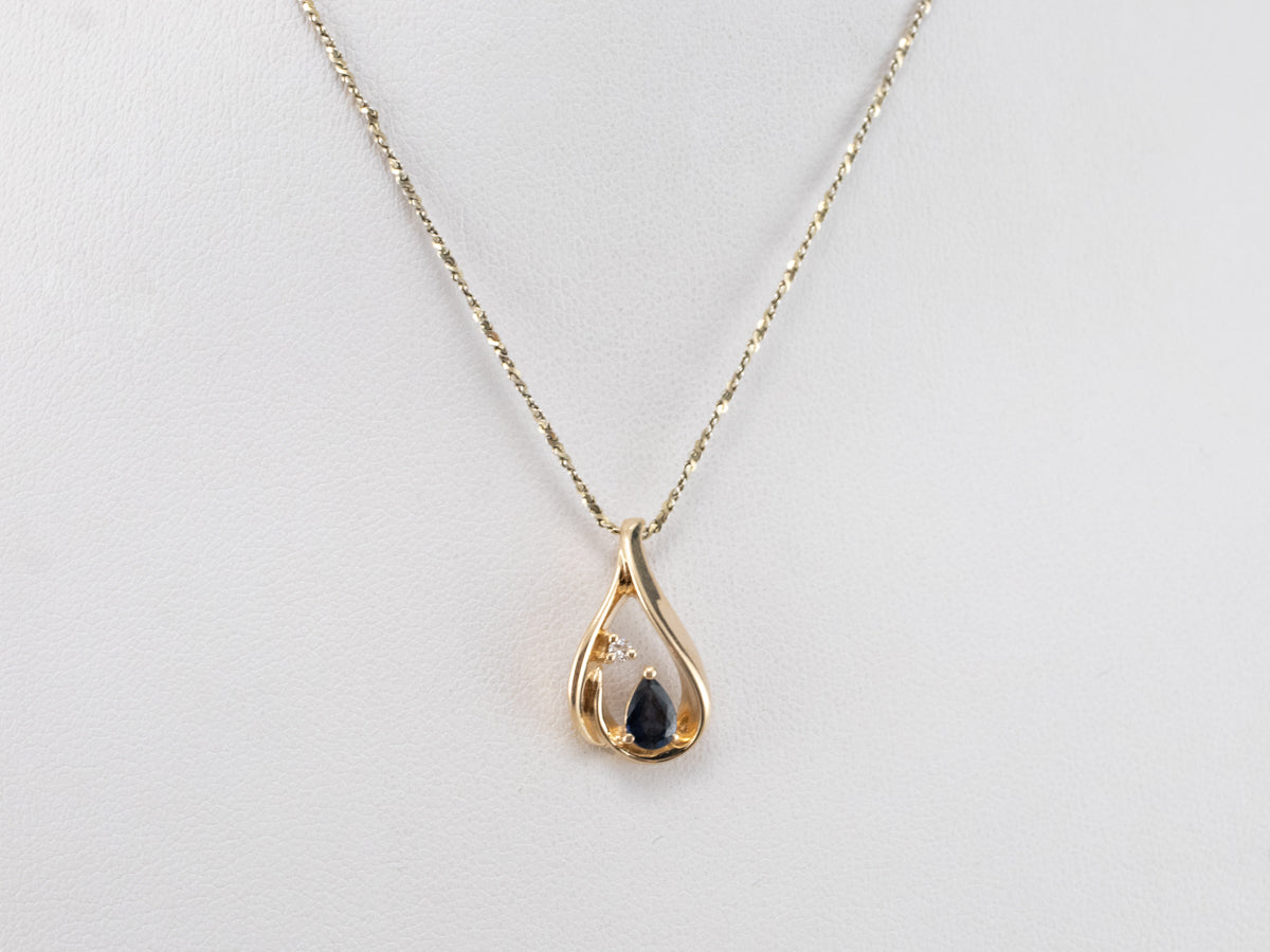 Colgante de oro, zafiro y diamantes