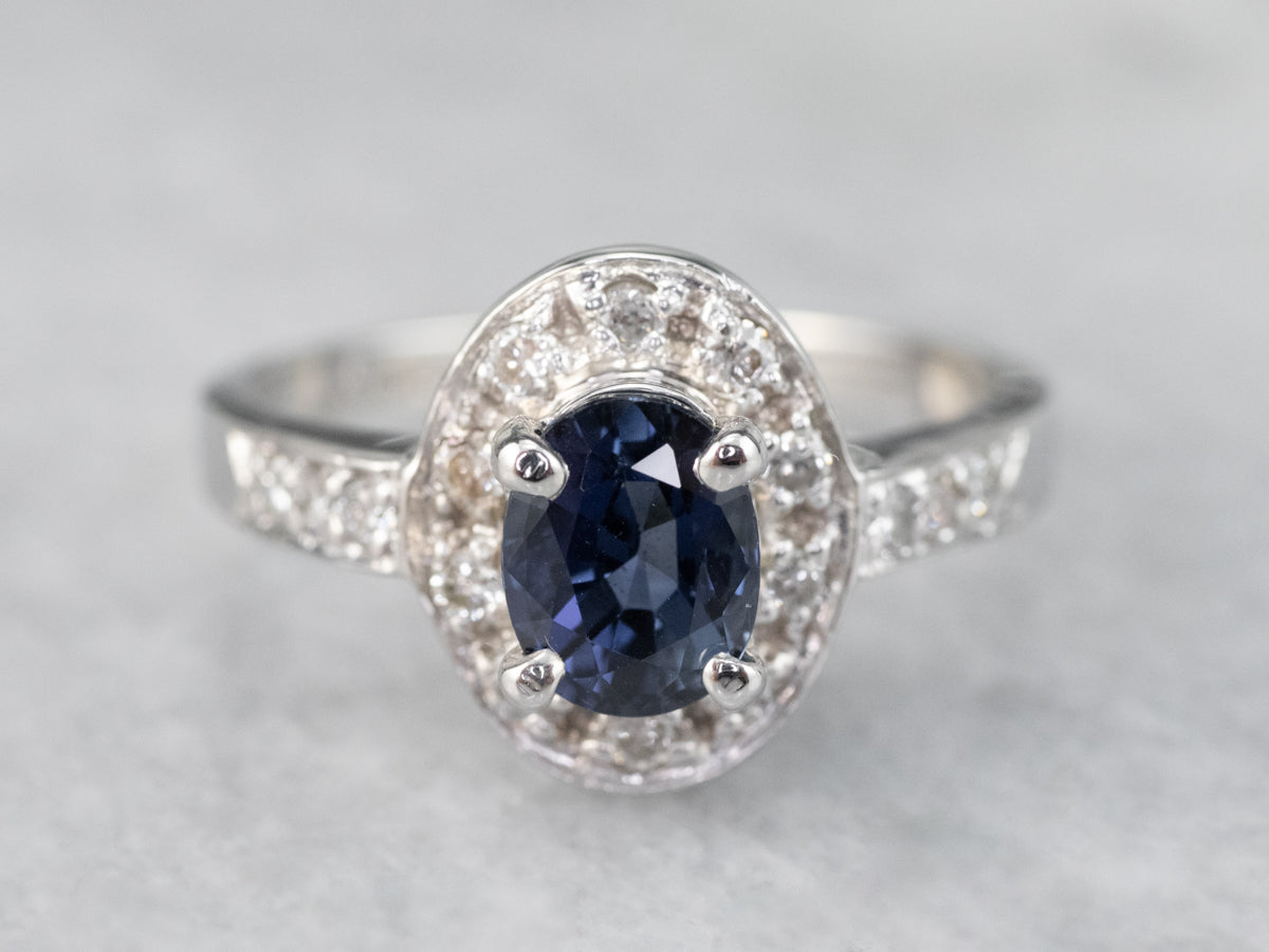 White Gold Sapphire and Diamond Modern Halo Engagement Ring
