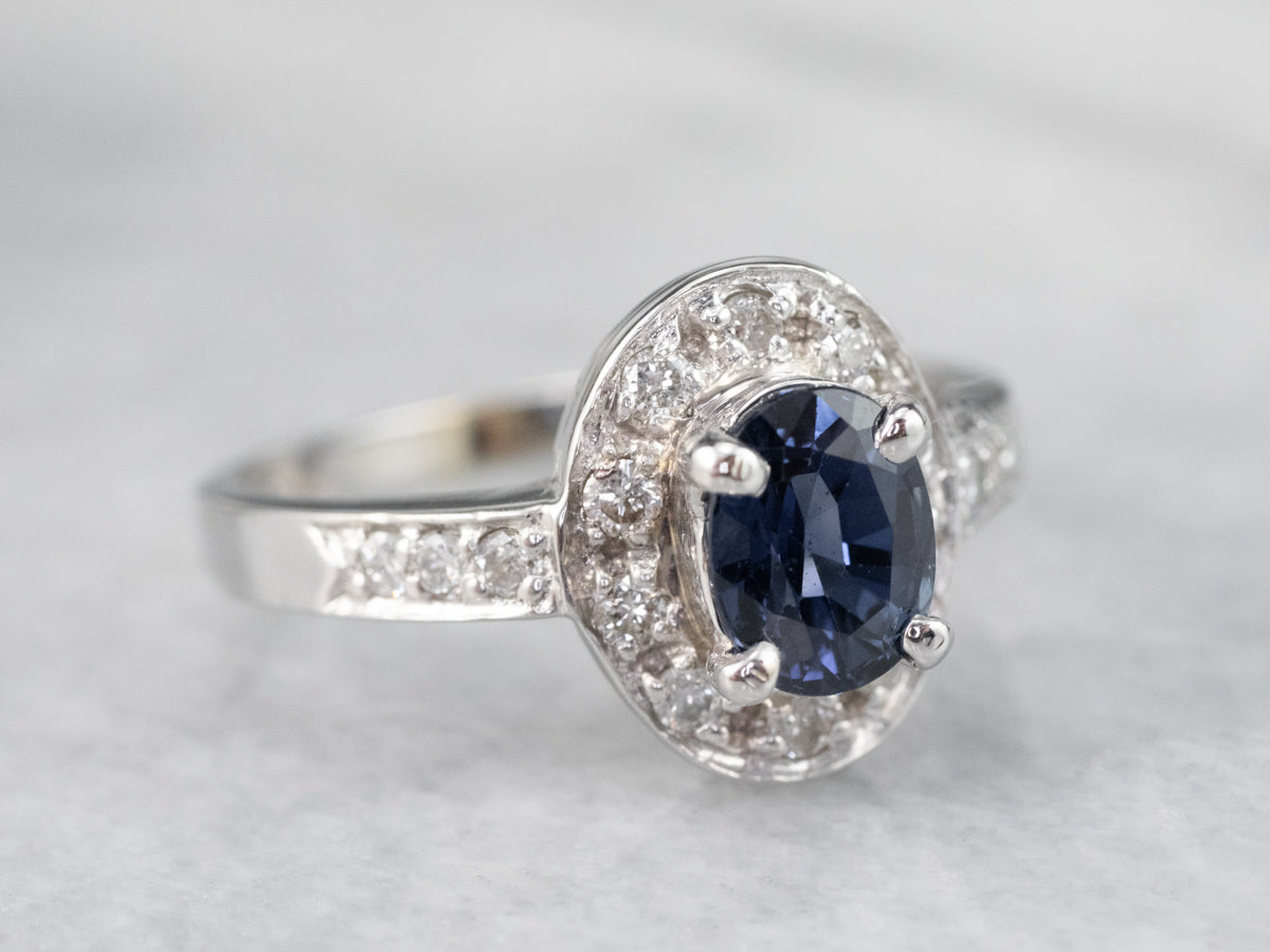 White Gold Sapphire and Diamond Modern Halo Engagement Ring