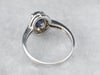White Gold Sapphire and Diamond Modern Halo Engagement Ring