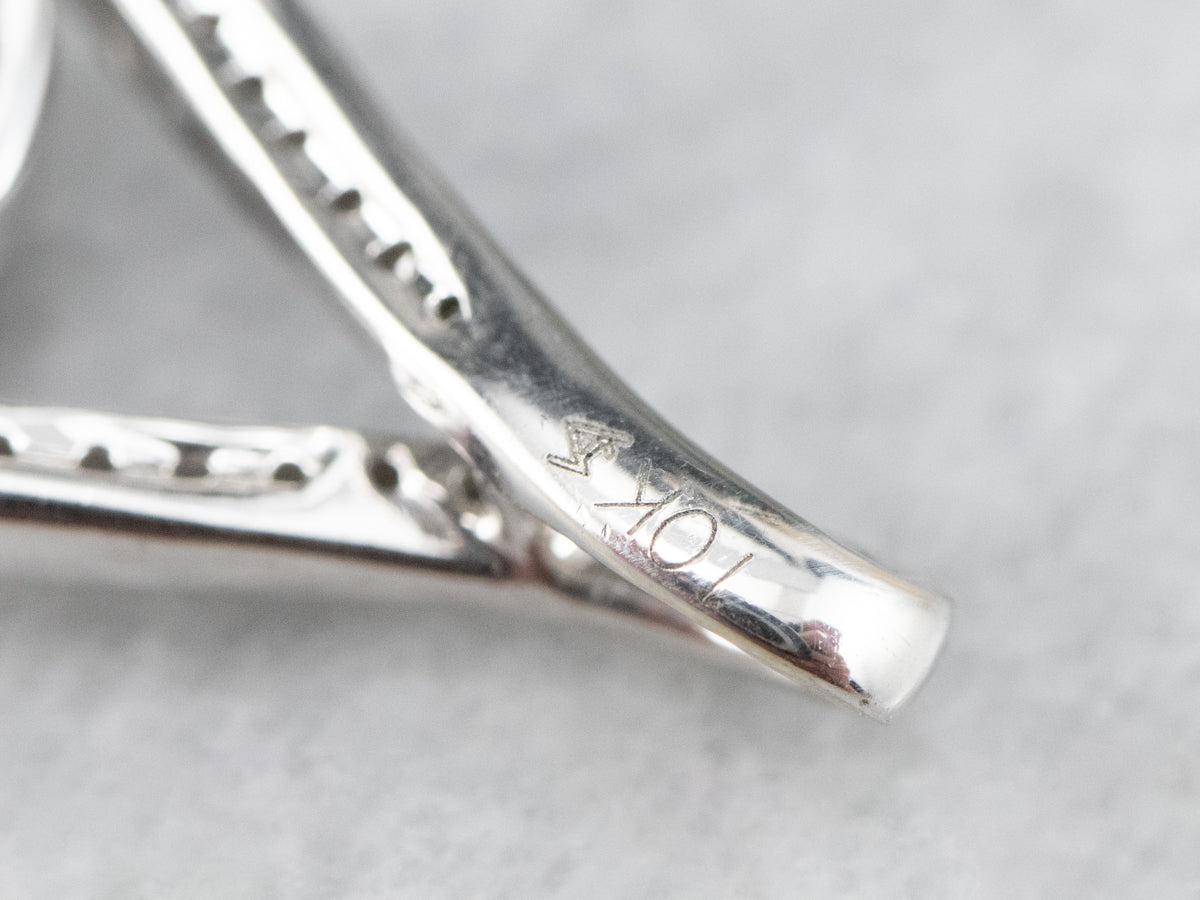 Modern White Gold and Diamond Halo Pendant