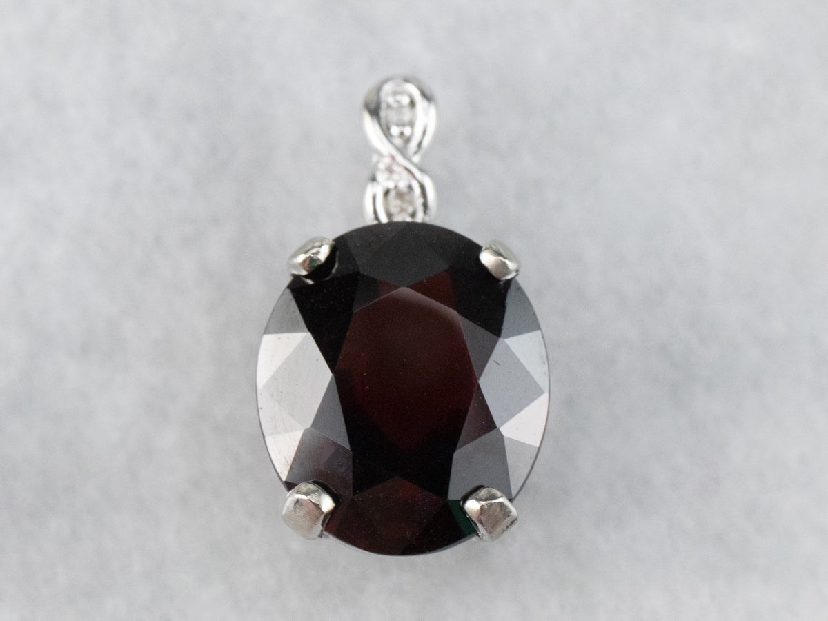 White Gold Garnet and Diamond Pendant