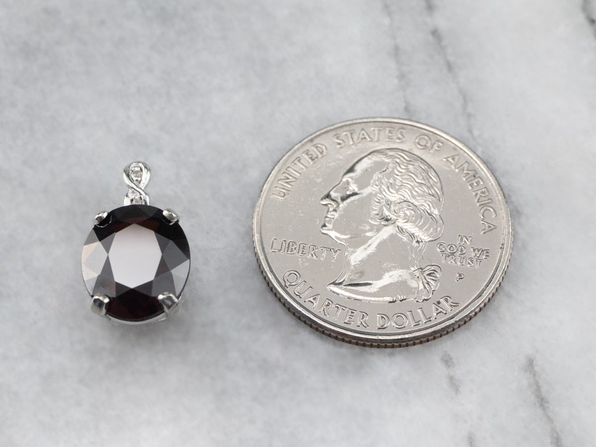 White Gold Garnet and Diamond Pendant