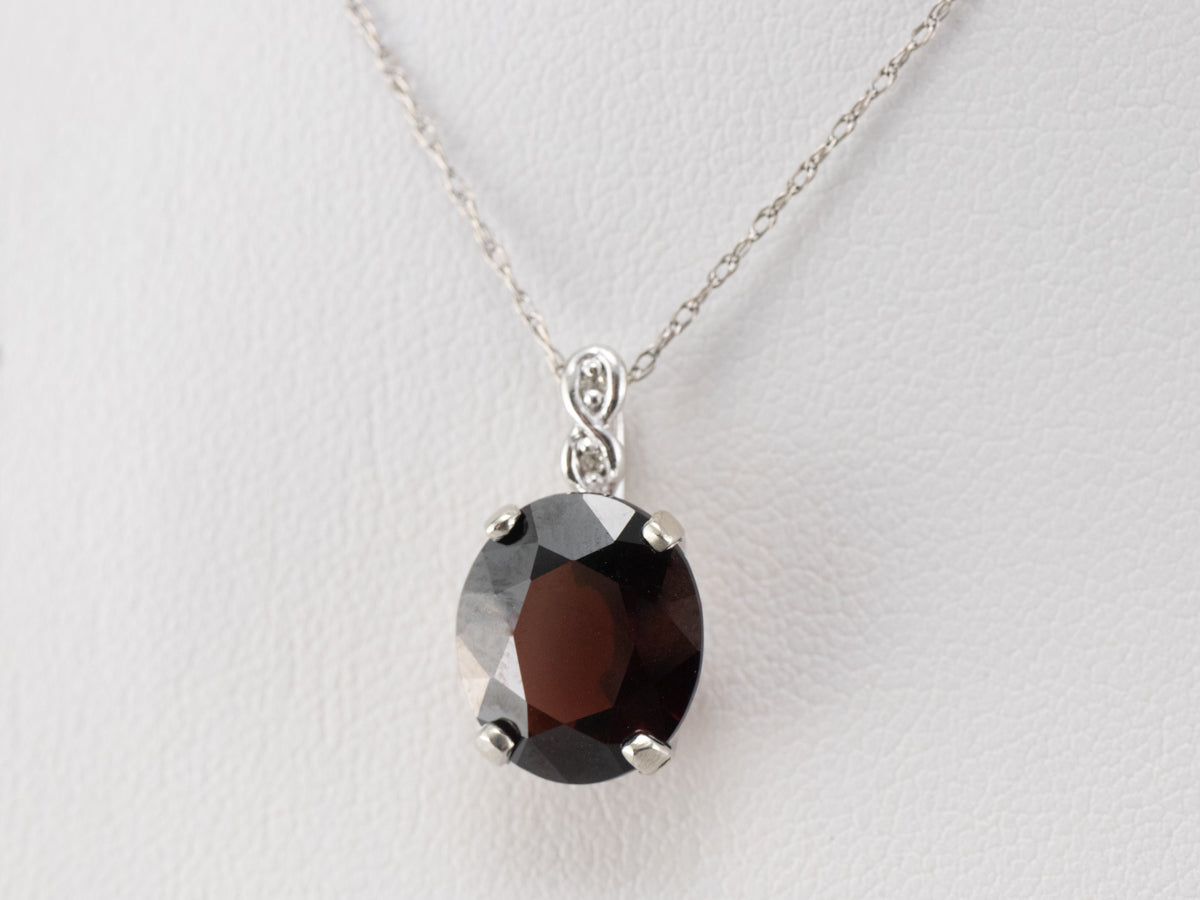White Gold Garnet and Diamond Pendant