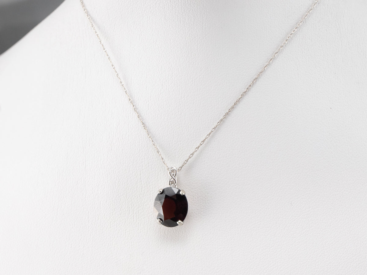 White Gold Garnet and Diamond Pendant