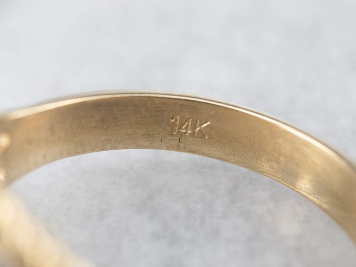 Twisting Sapphire and Diamond Band