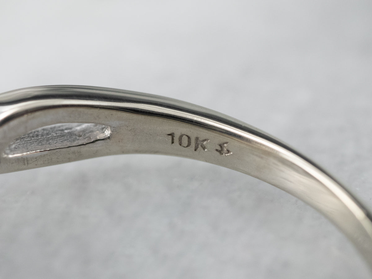 Looping Diamond Halo Engagement Ring