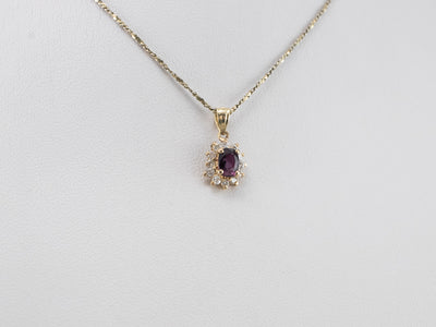 Purple Sapphire and Diamond Gold Pendant