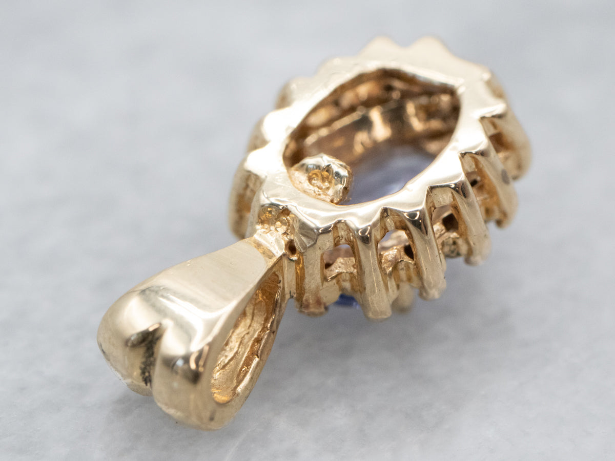 Tanzanite and Diamond Halo Pendant