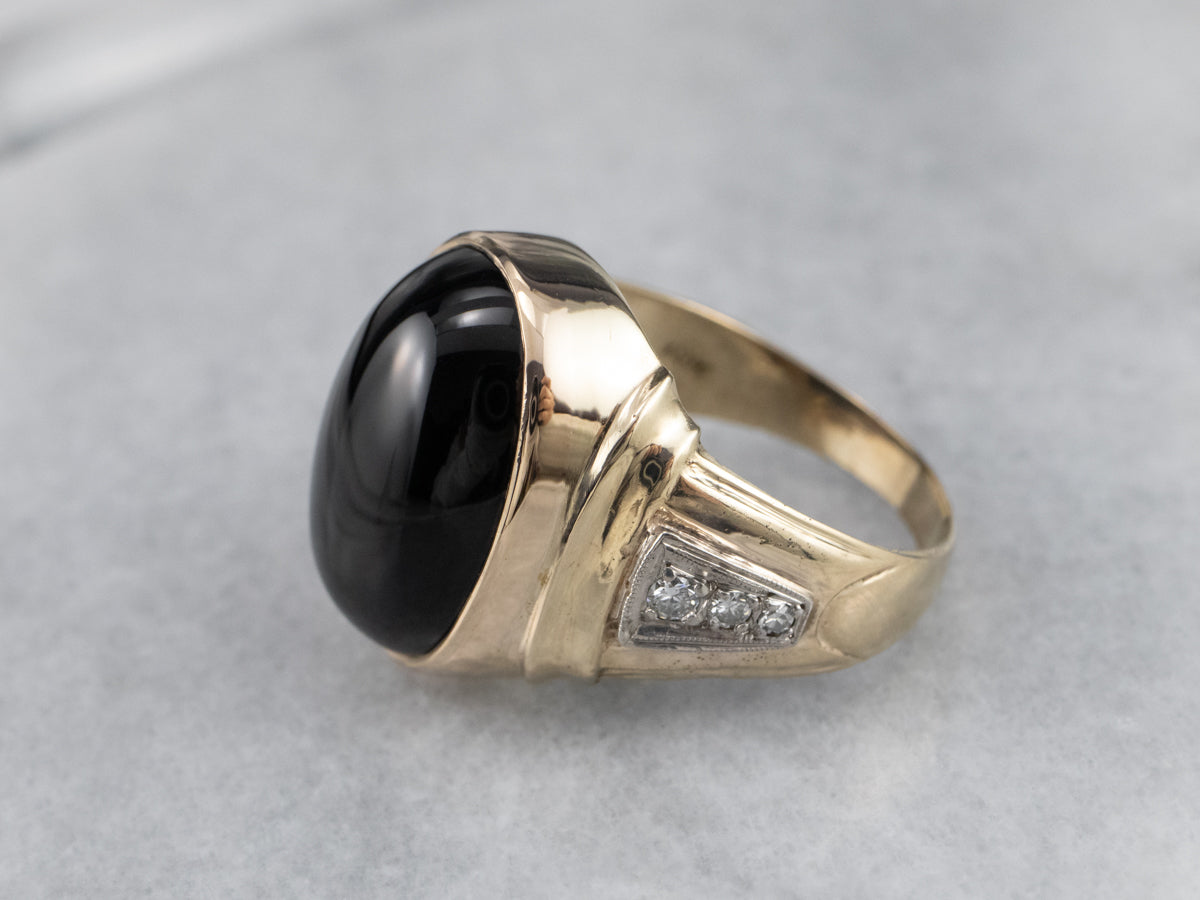 This bold vintage men‚Äôs onyx ring is an iconic classic! This...