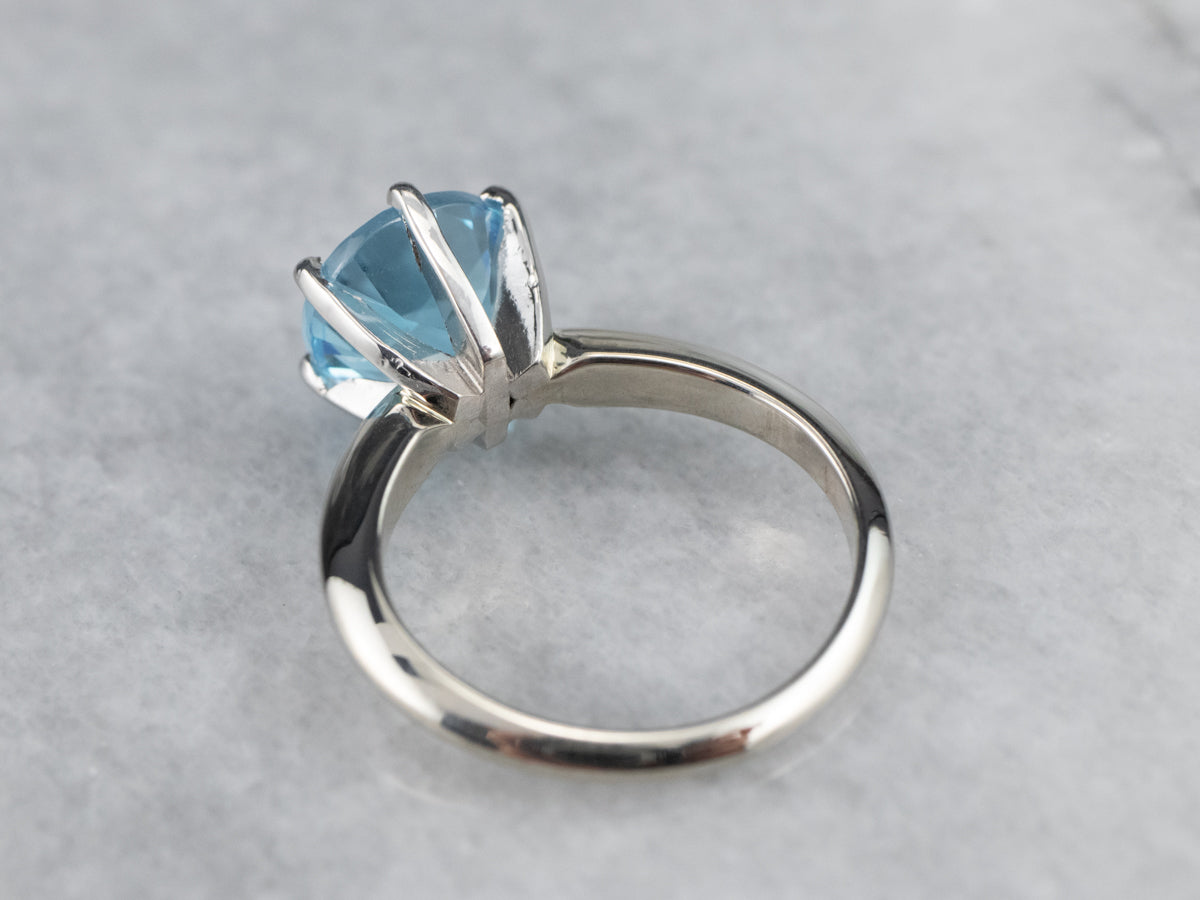 White Gold Blue Topaz Solitaire Ring