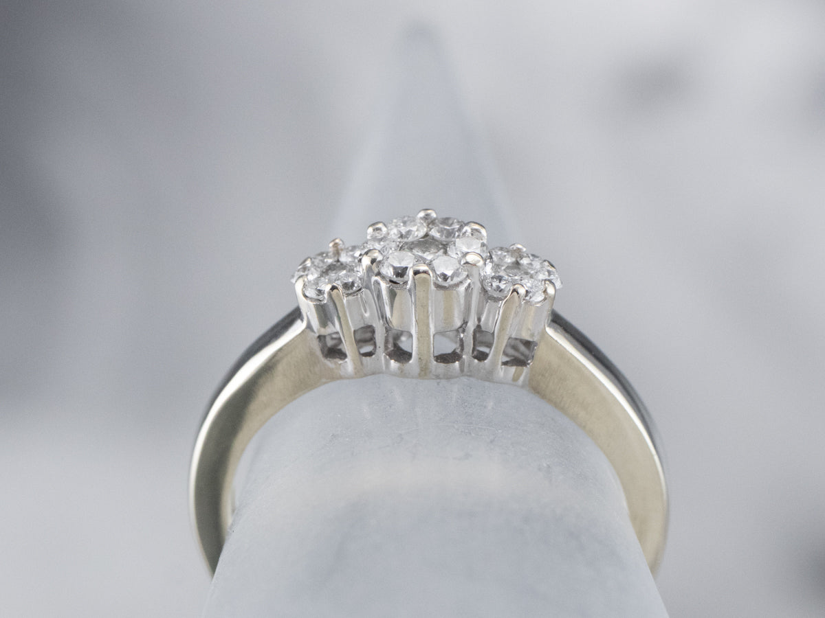 Three Diamond Halo Engagement Ring