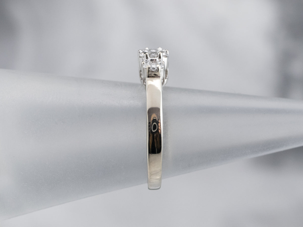 Three Diamond Halo Engagement Ring