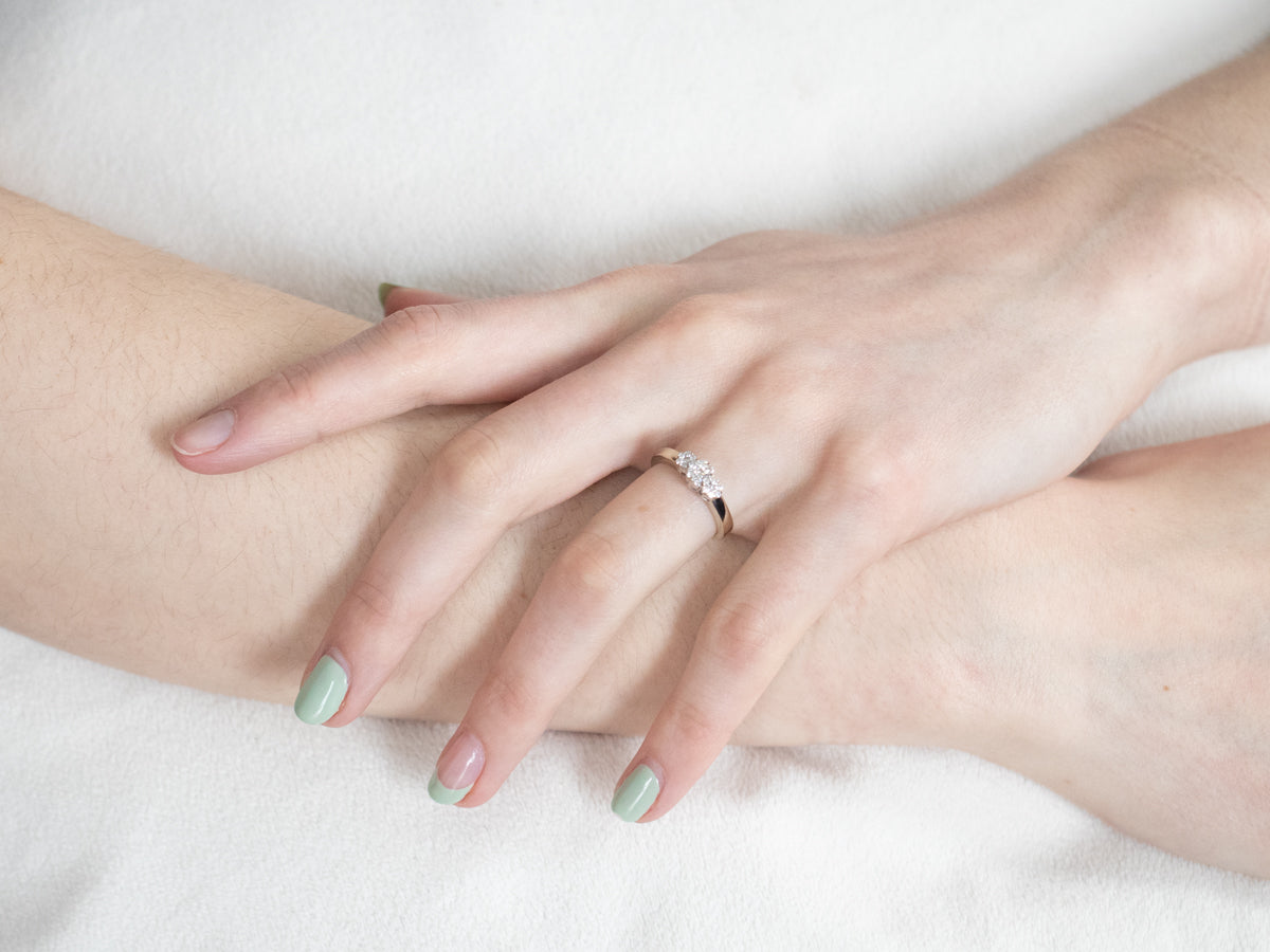 Three Diamond Halo Engagement Ring