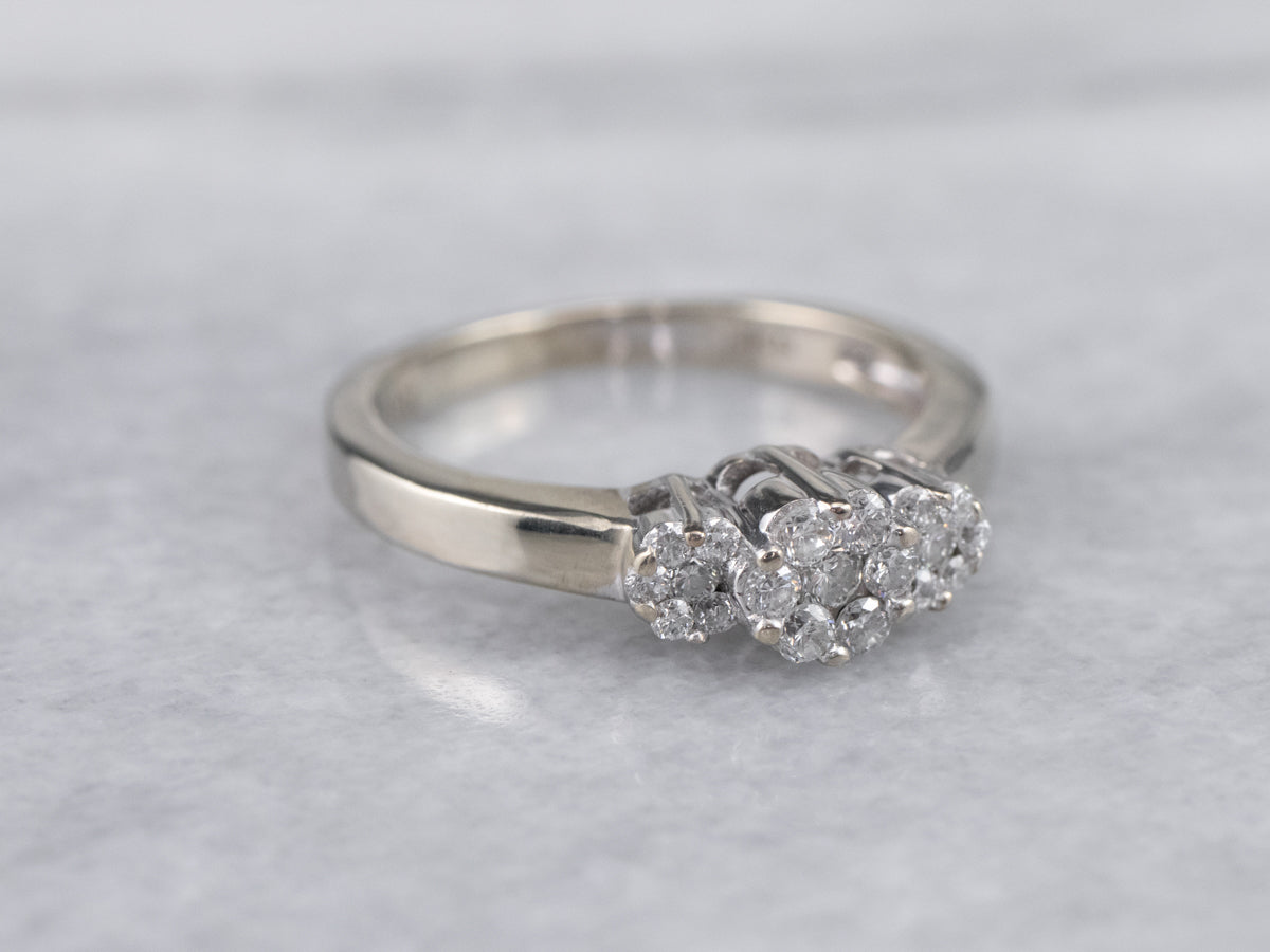 Three Diamond Halo Engagement Ring
