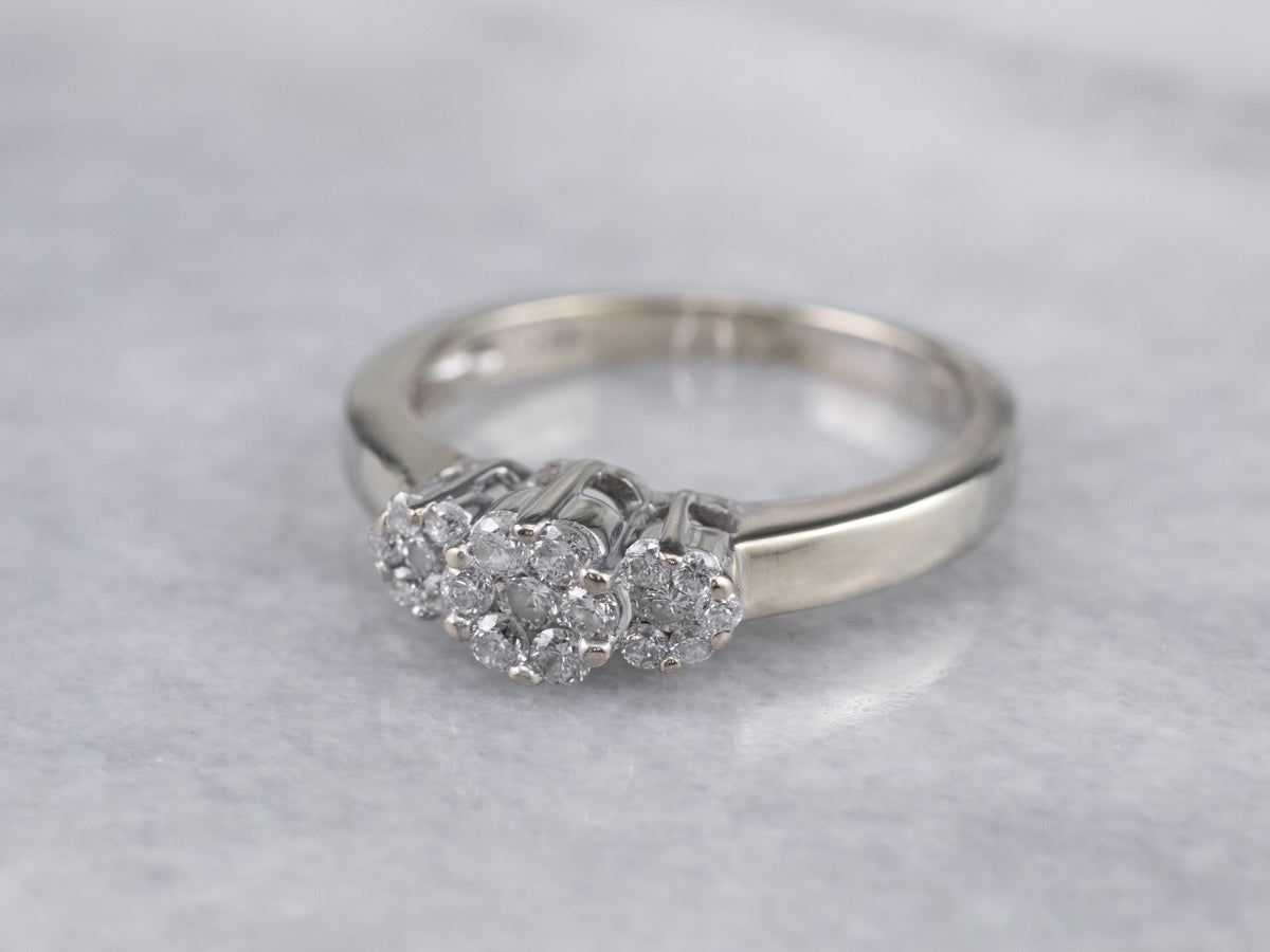 Three Diamond Halo Engagement Ring