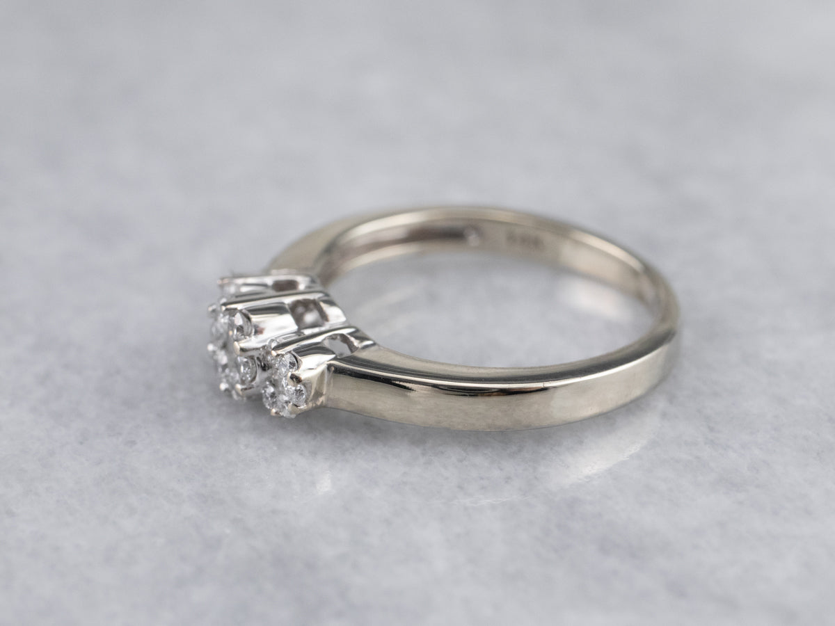Three Diamond Halo Engagement Ring