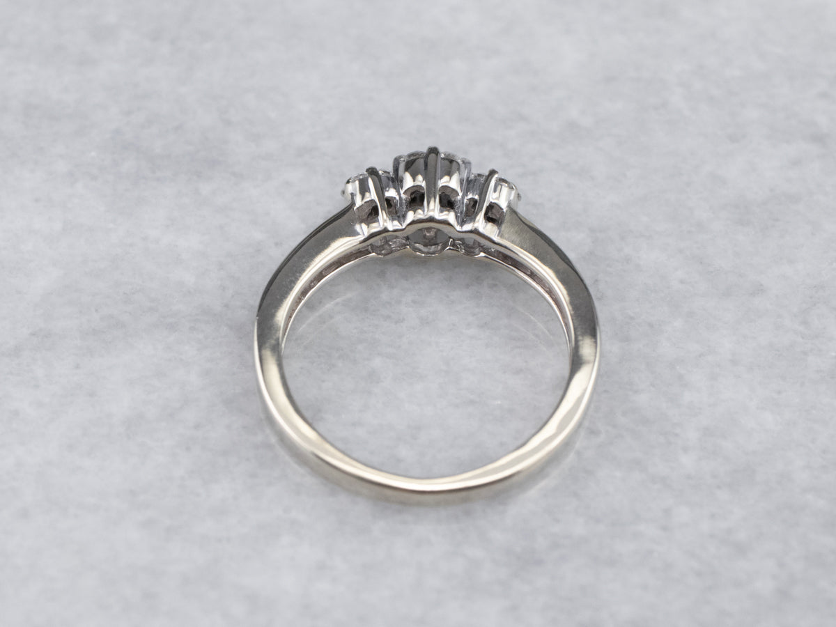 Three Diamond Halo Engagement Ring