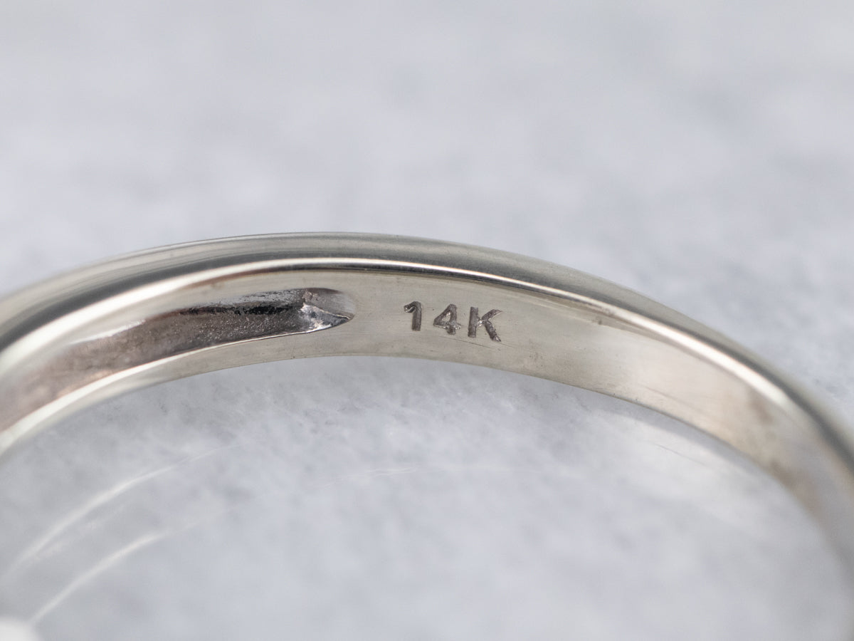 Three Diamond Halo Engagement Ring