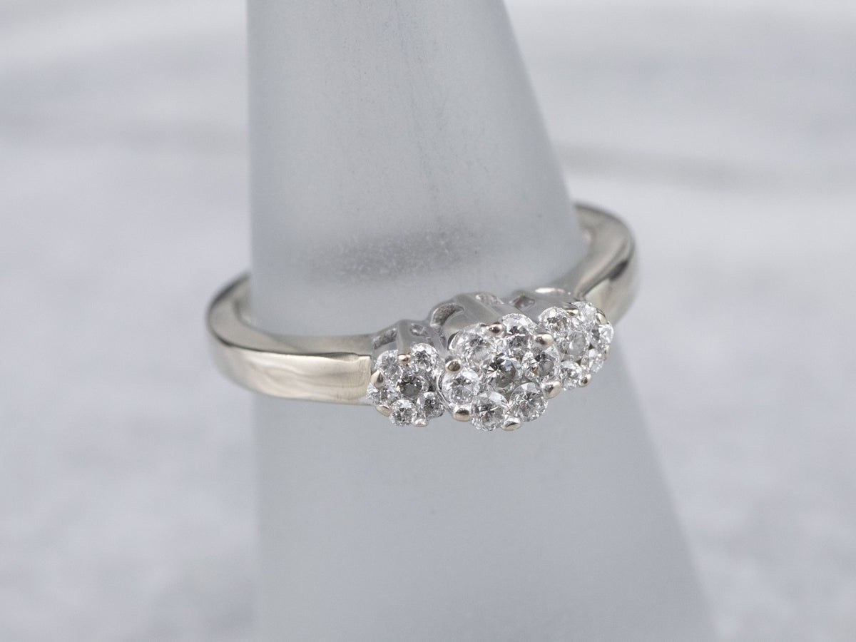 Three Diamond Halo Engagement Ring