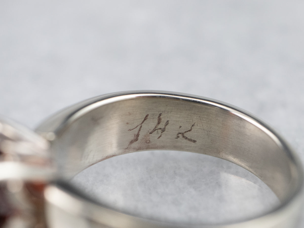 White Gold Garnet Solitaire Ring