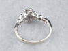 Looping Diamond Halo Engagement Ring