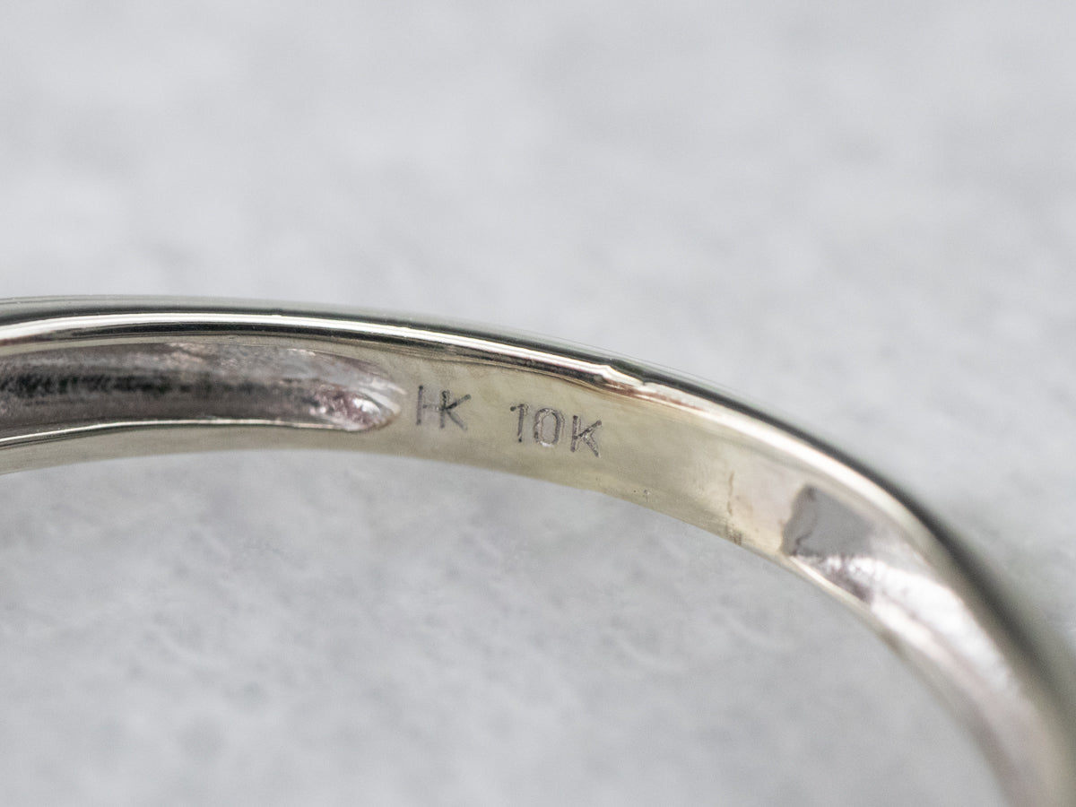 Looping Diamond Halo Engagement Ring