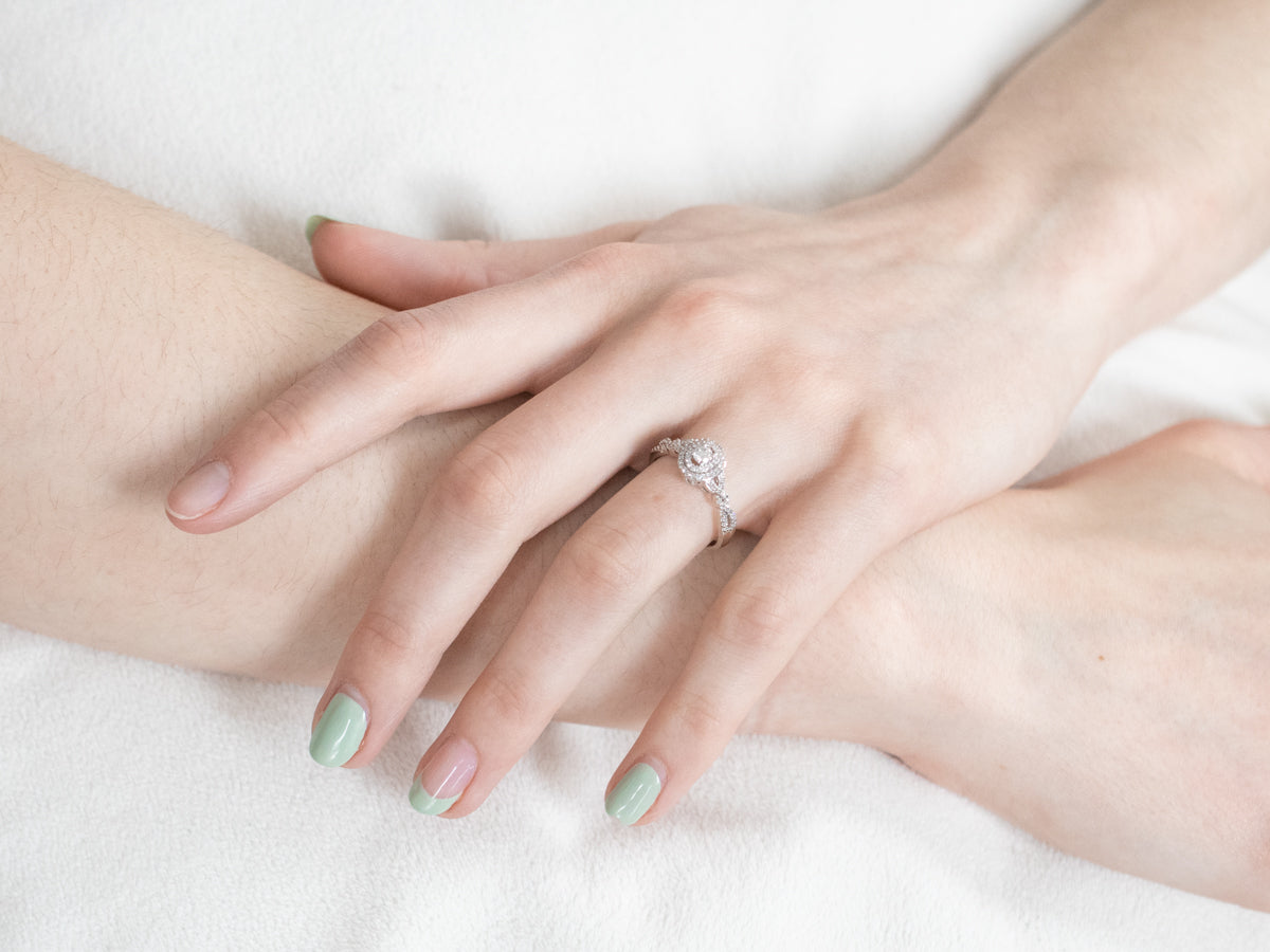 Looping Diamond Halo Engagement Ring