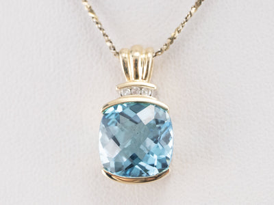 Gold Blue Topaz and Diamond Pendant