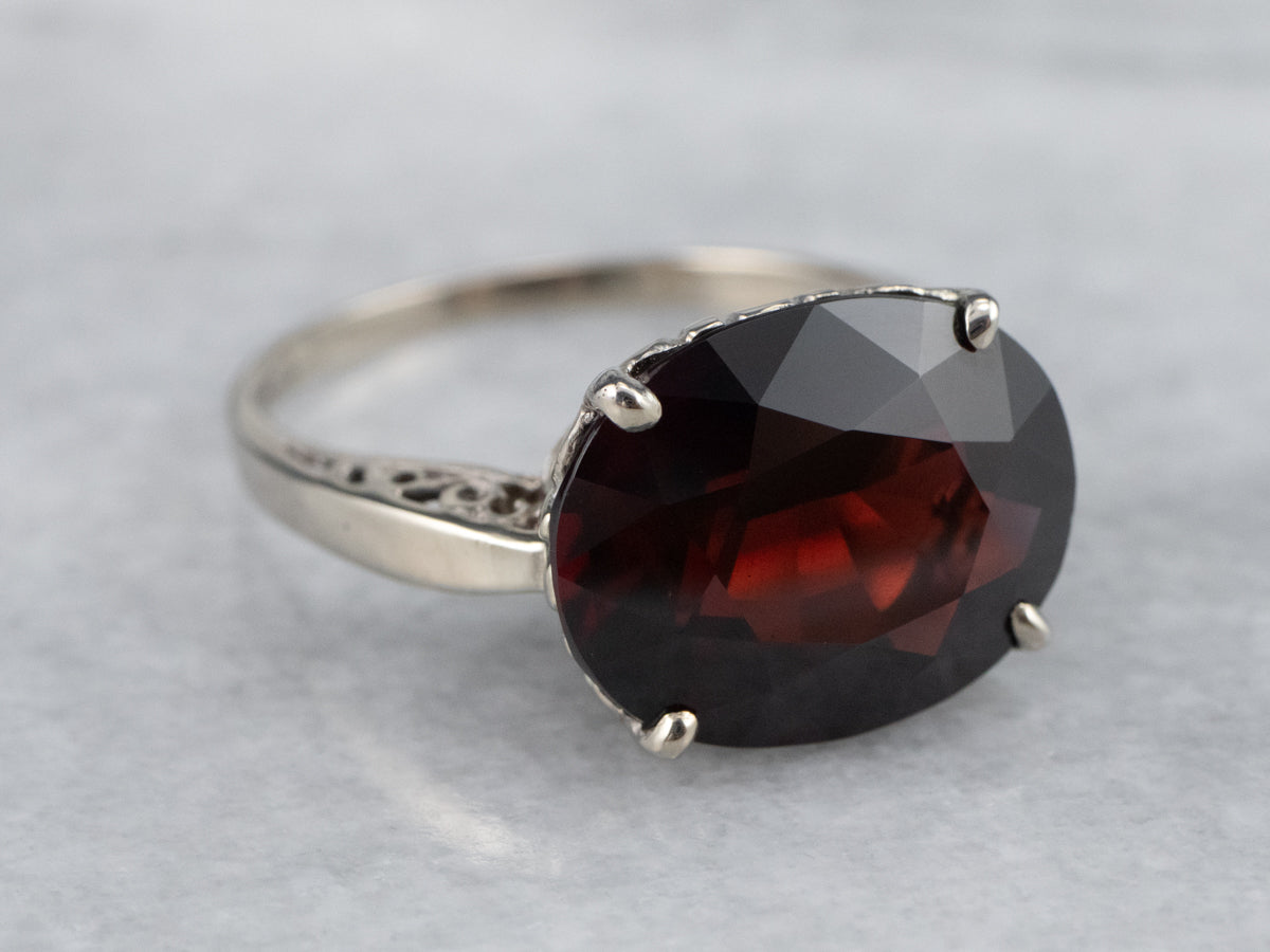 White Gold Garnet Solitaire Ring