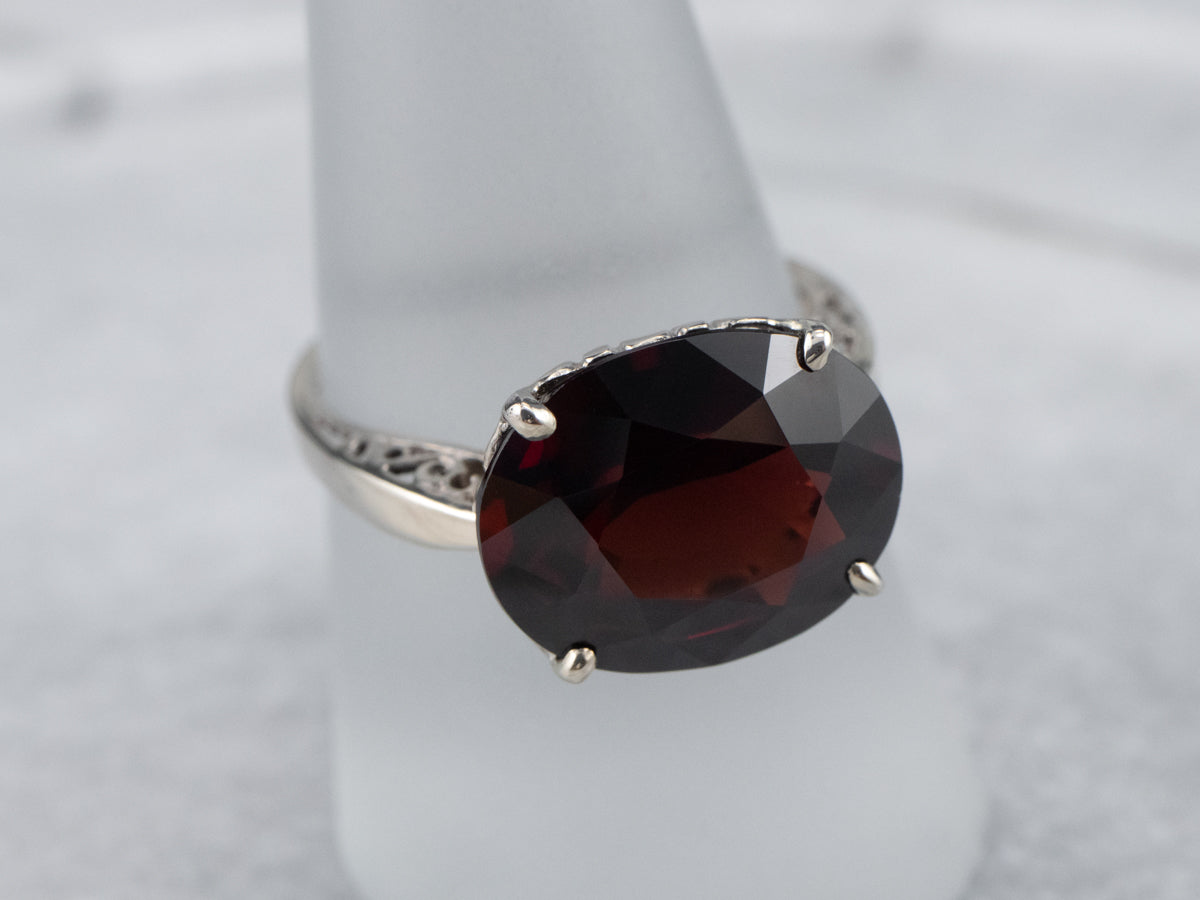 White Gold Garnet Solitaire Ring