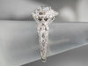 Modern Pear Cut Diamond Halo Engagement Ring
