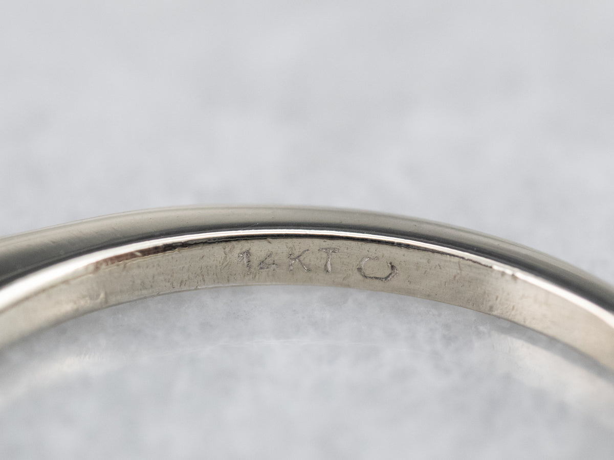 Alianza de boda de oro blanco con diamantes