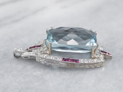 Spectacular Natural Blue Topaz, Diamond and Ruby Pendant from the Art Deco Era