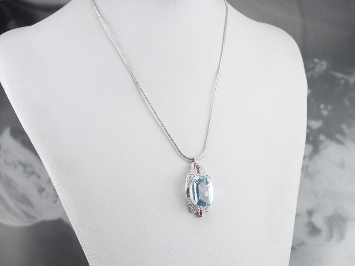 Spectacular Natural Blue Topaz, Diamond and Ruby Pendant from the Art Deco Era